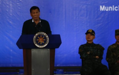 <p><strong>BALIK BARIL PROGRAM.</strong> President Rodrigo R. Duterte delivers his speech during the Balik Baril program launching in Maguindanao on Wednesday (April 25). <em>(Photo by PNA Cotabato bureau)</em></p>